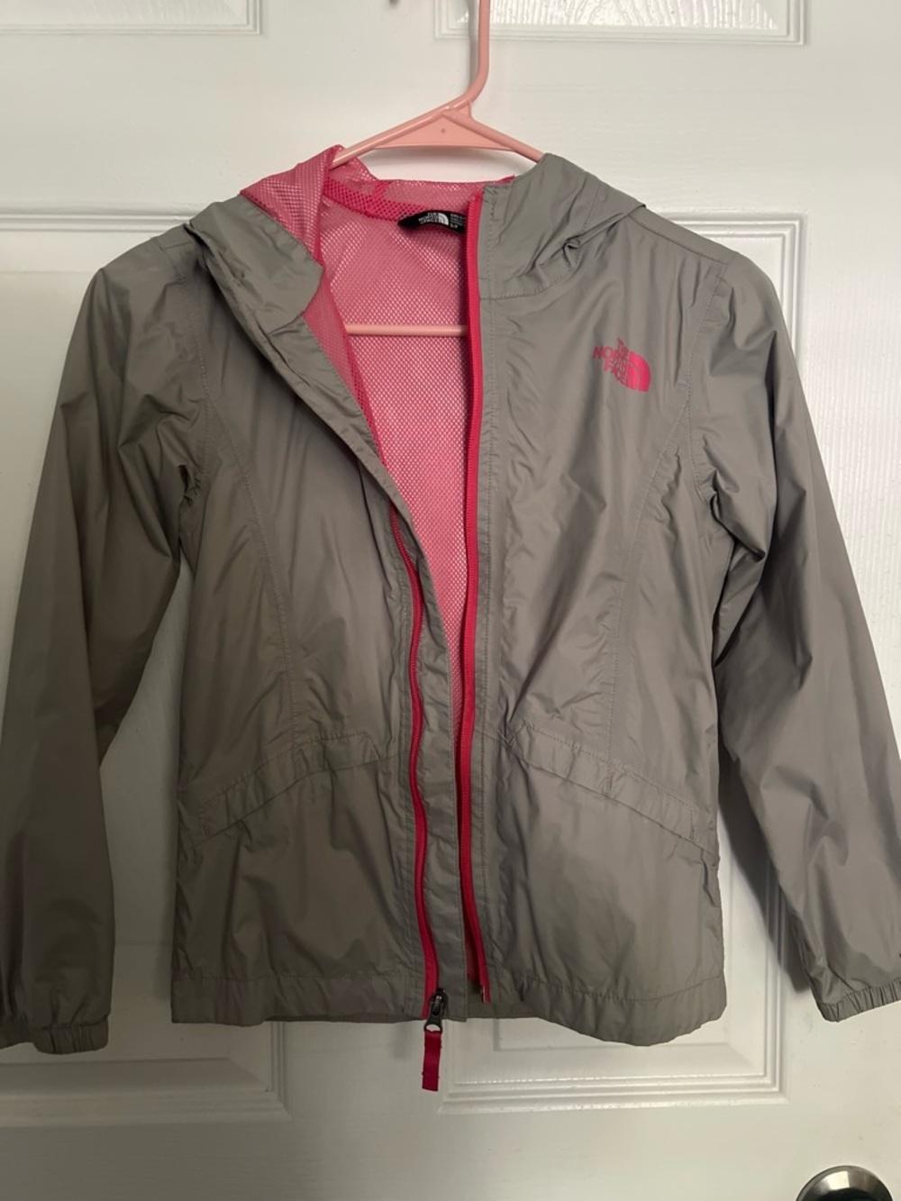 The North Face Kids Hooded Rain Jacket in Gray with Pink Accents